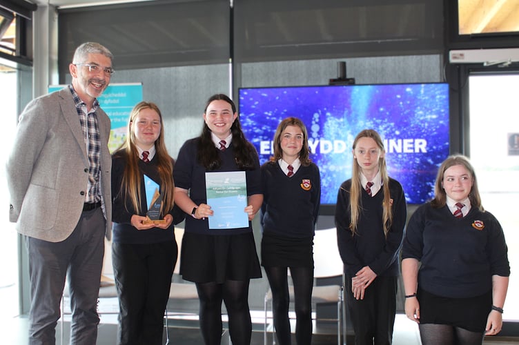 Future Generations Commissioner Derek Walker with learners from Gwernyfed High School