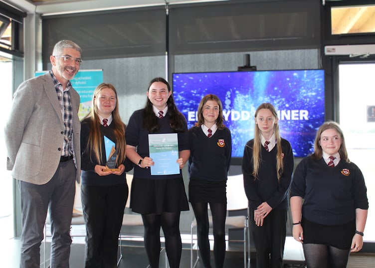 Future Generations Commissioner Derek Walker with learners from Gwernyfed High School