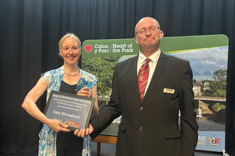 Katy Sinnadurai BEM receives the Personal Achievement Award from Cllr John Powell