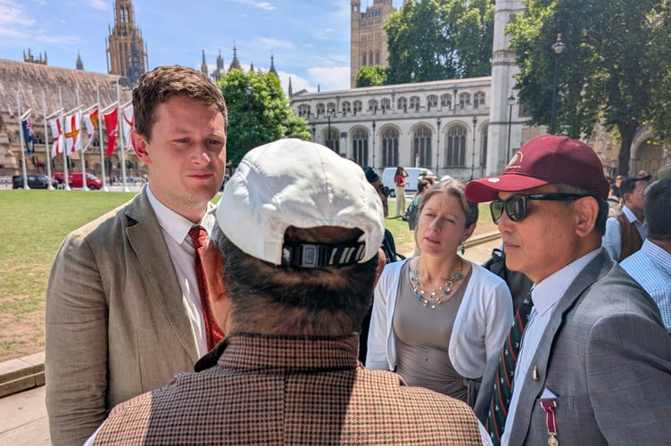 David Chadwick speaking with Gurkha veterans at Parliament Square