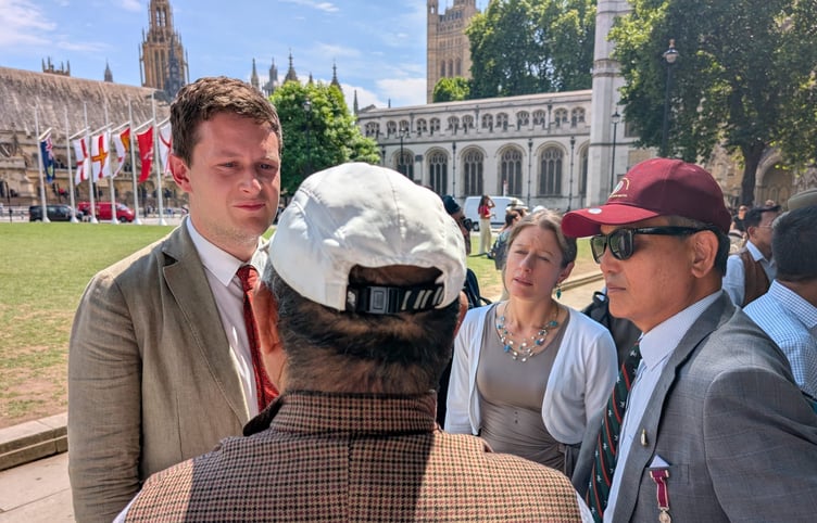 David Chadwick speaking with Gurkha veterans at Parliament Square