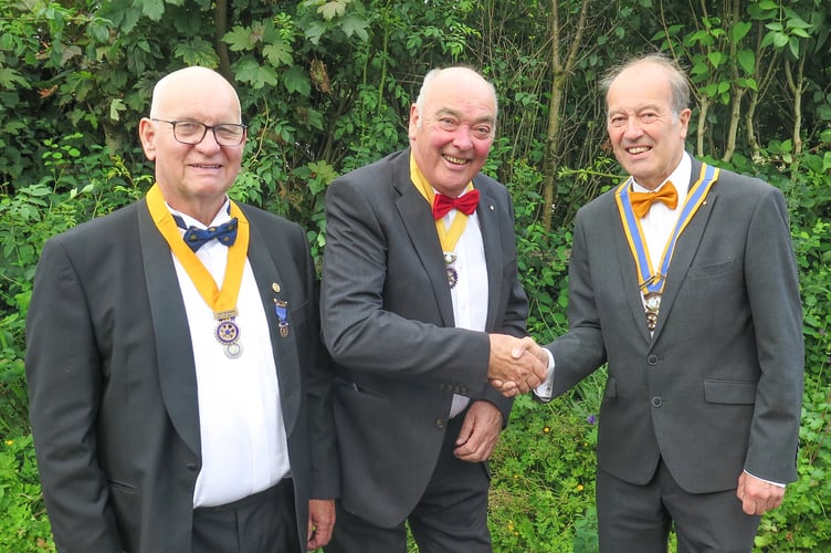 Left to right: Vice President Richard Davies, President Hugh Garner, Outgoing President Robert Evans