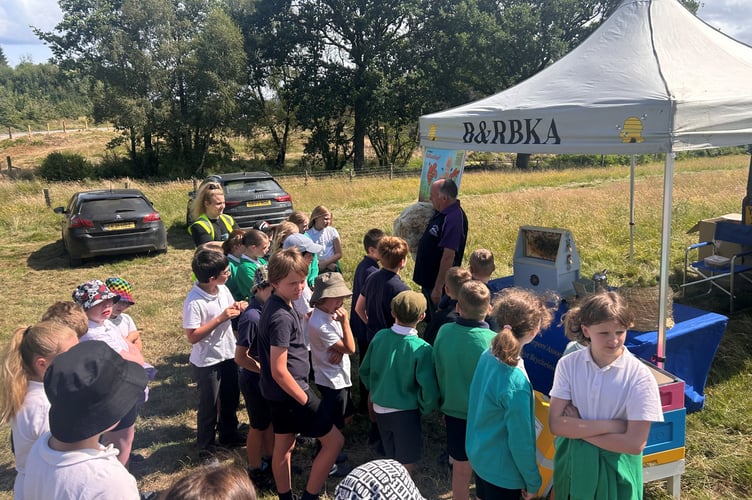 Local schoolchildren from Builth Wells and Llanelwedd with NFU Cymru Brecon & Radnor Chairman Rob Powell