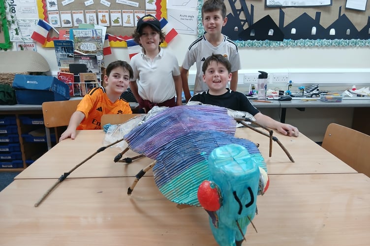 Pupils from Newbridge-on-Wye School helped bring the legend to life by building giant bluebottles during a creative workshop with artist Geraint Edwards