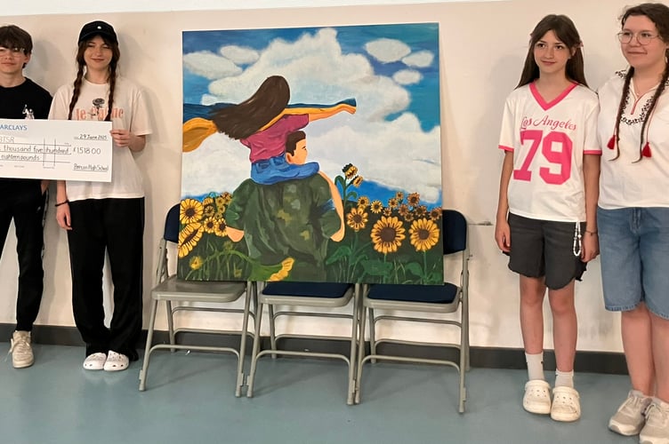 Max, Kameliia, Kseniia and Sofiia with their painting