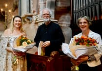 Rowan Williams and Hilary Davies perform at Llansantffraed Church