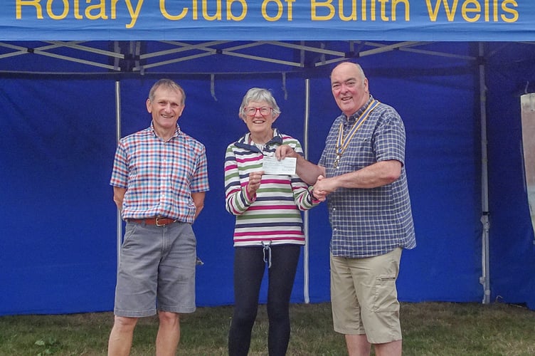 Left to right: Friends Treasurer David Sutherland and Chairperson Jenny Ryan accept a cheque from Builth Wells Rotary President Hugh Garner