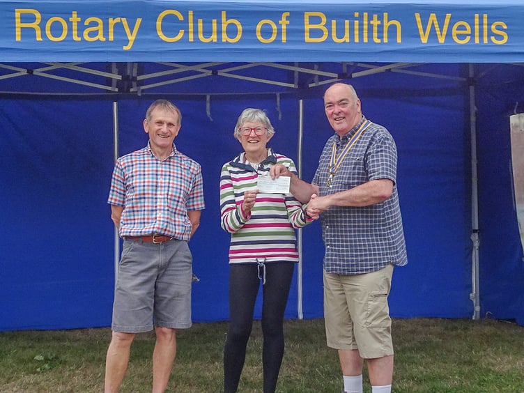 Left to right: Friends Treasurer David Sutherland and Chairperson Jenny Ryan accept a cheque from Builth Wells Rotary President Hugh Garner