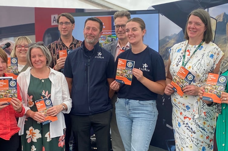 From left: Rhiannon Jane-Raftery from Community Rail Network, Rebecca Butcher, brochure editor, Kirsty Lockwood from Kirsty Lockwood Furnishings, Owen Griffkin, CRP community rail officer, Leon Tarr from Radnor Hills, Jake Berriman, leader of Powys County Council, Megan Birch from Radnor Hills, Claire Sterry from PAVO and Clair Swales, PAVO chief executive