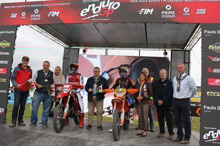 Local councillors flag off the first riders together with FIM director John Collins