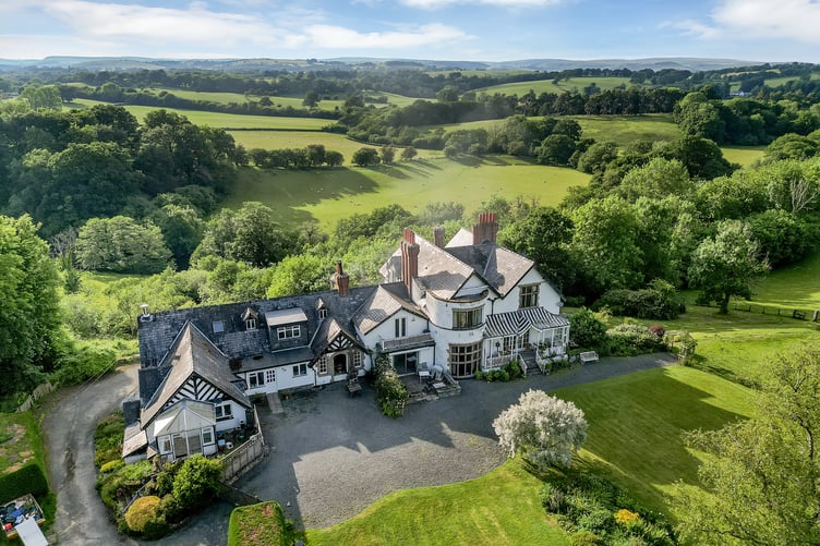 The three-storey principal residence at Cefnllysgwynne Estate offers extensive views over the Irfon Valley
