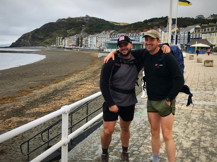 Toby Weale and walking partner setting off from Aberystwyth