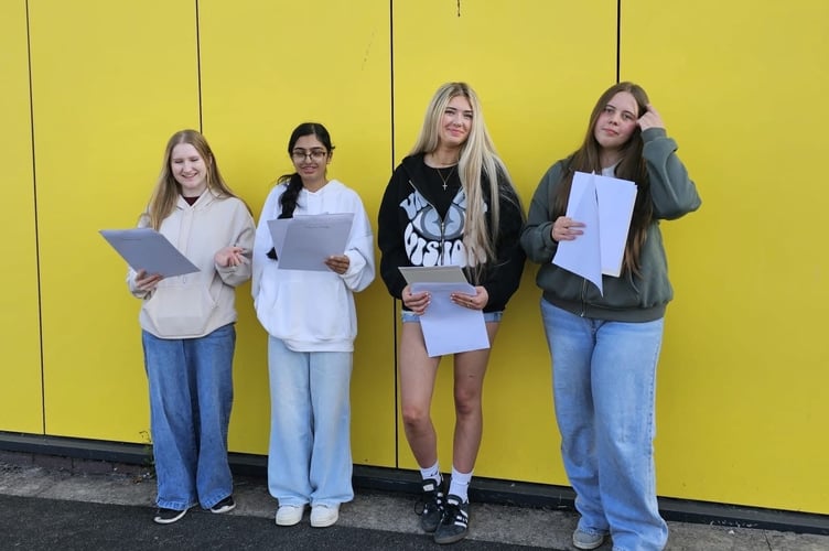 Students Alex Robson, Mahnoor Solangi, Tilly Doran and Tailor Pippins at Ysgol Maesydderwen this morning