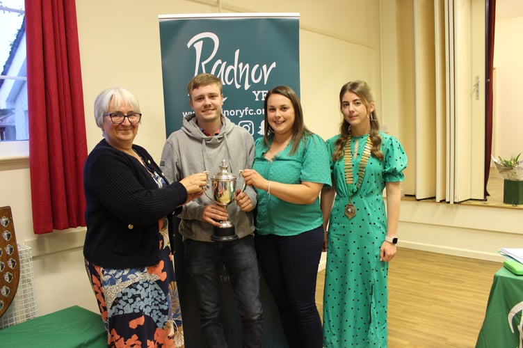 Radnor YFC President, Sharon Hammond presenting the Trevaughan trophy to Ben Davies and Sian Davies of Edw Valley YFC accompanied by County Chair, Elizabeth Swancott