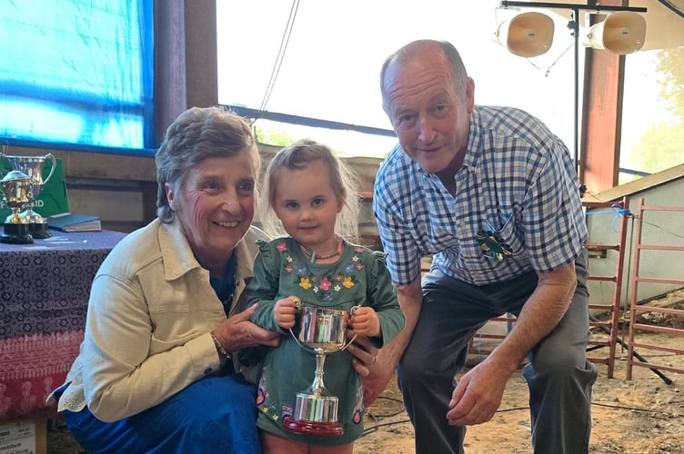 Show Presidents Mr & Mrs D Jones with Darcie, who won the Under 5 Cup