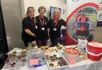 Brecon bank staff whip up £500 fundraiser for air ambulance