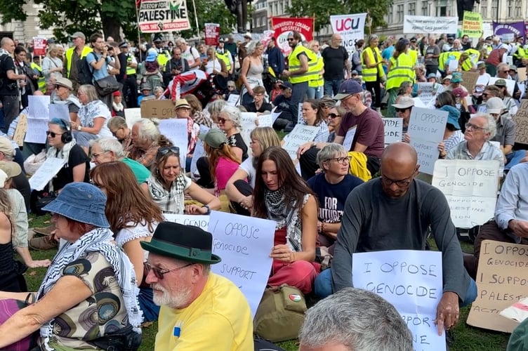 Protesters gathered in Parliament Square, London, on Saturday 