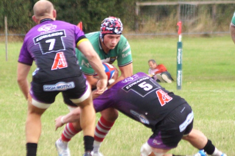 Chad Thomas carries hard into the heart of the Ponty defence