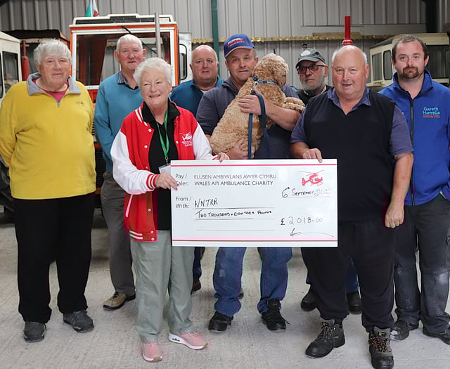 Three charities share over £6,000 raised by tractor run