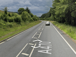 No injuries reported after van flipped onto its side on A470