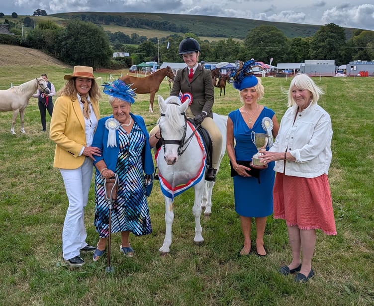Grace Davies with Dusty, winning Supreme Champion in the Horse Section