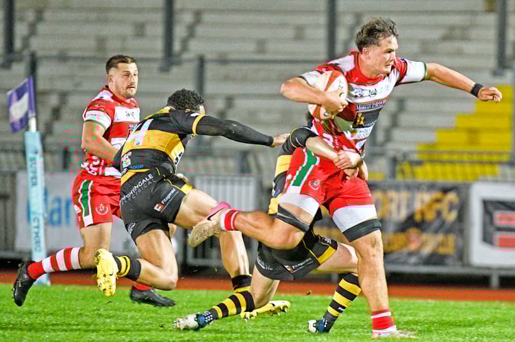 Newport try to stop another second half attacking run from Llandovery