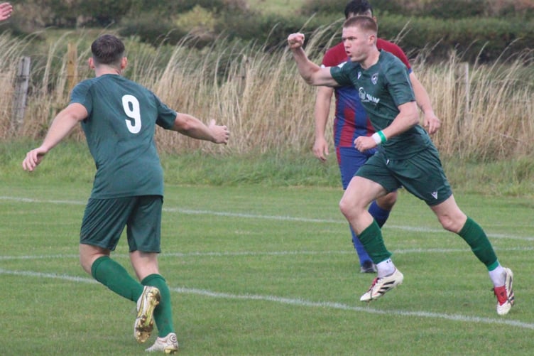 Ieuan Price celebrates after opening the scoring for Radnor Valley