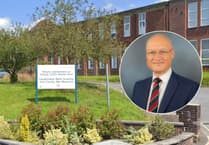 Powys health board reports £34.7m three-year deficit