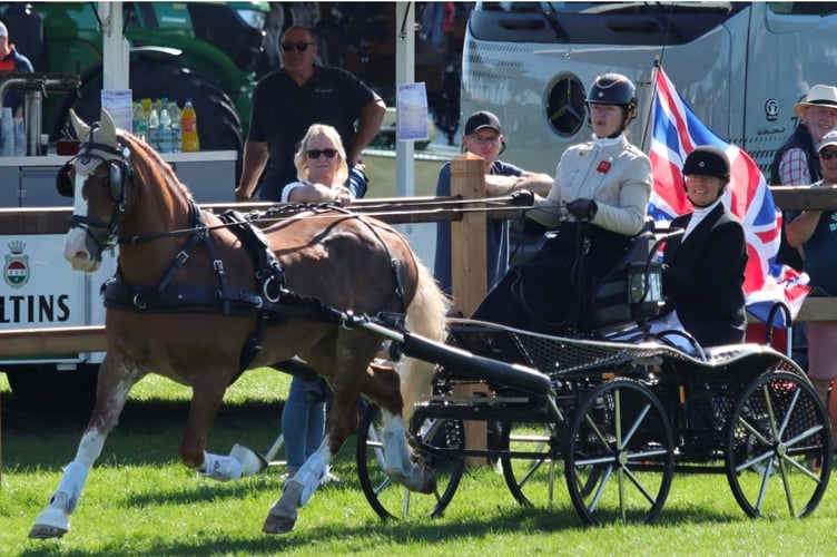 The lap of honour for Emily and Alfie for their podium place in the cones