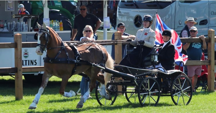 The lap of honour for Emily and Alfie for their podium place in the cones