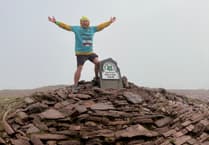 Pen y Fan Dan smashes climb record for bowel cancer awareness