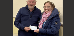 Choir present £800 cheque to Bracken Trust