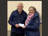 Choir present £800 cheque to Bracken Trust