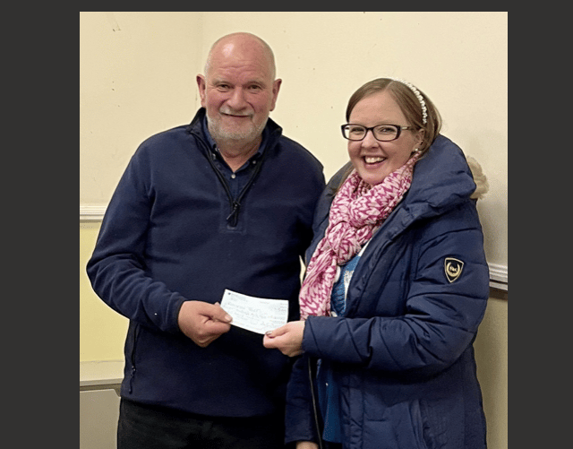 Choir present £800 cheque to Bracken Trust