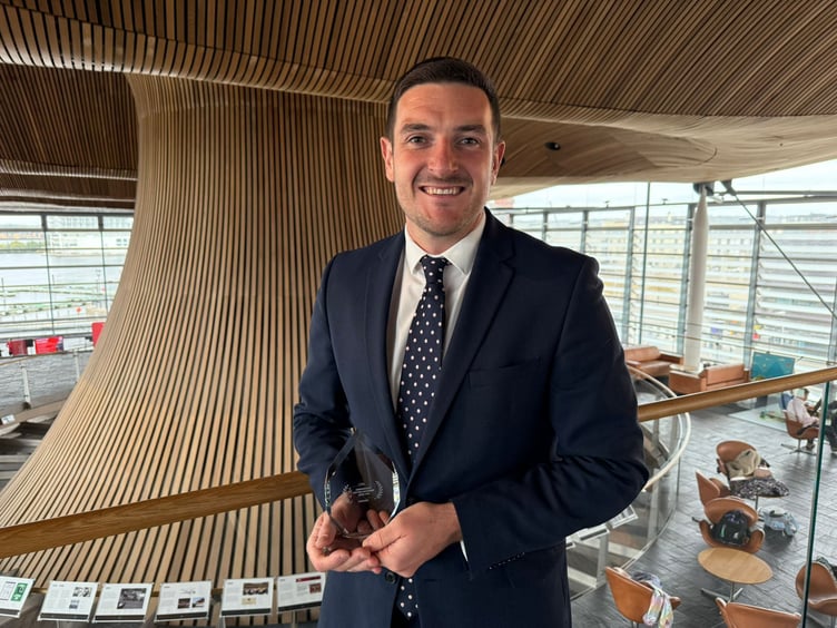 James Evans with the award