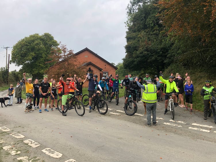 Runners, walkers, and riders gather at the start of the Huntington Chase