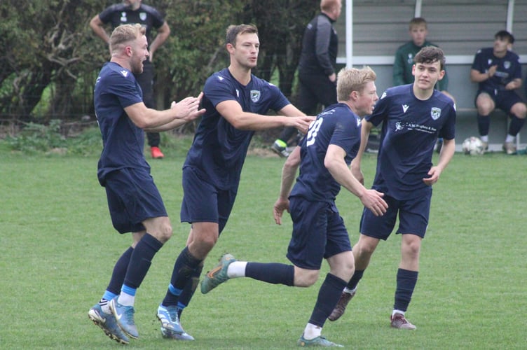 Radnor Valley players celebrate Joey Price’s dramatic late equaliser