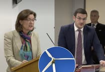 First Minister defends wind farms, says Powys must contribute