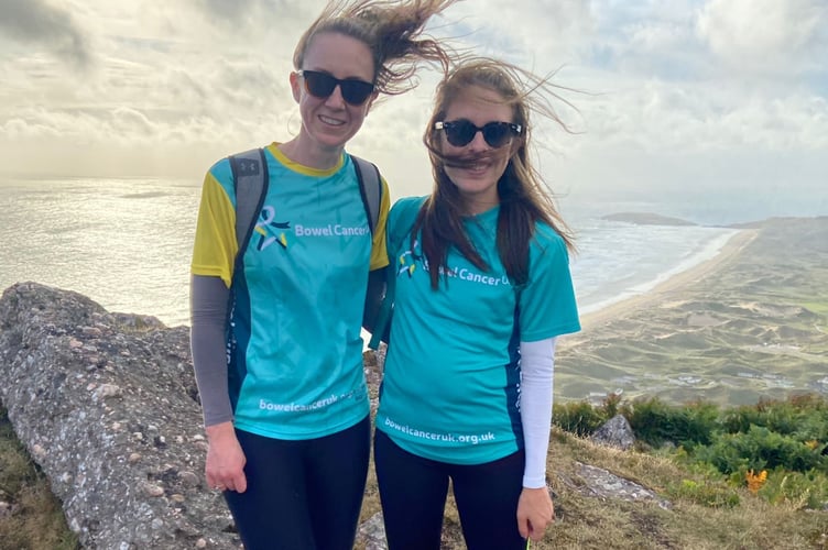 Rachel Mathias (right) and her friend Alice on Bowel Cancer UK's Sunset Trek in 2023