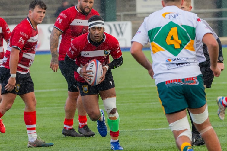 Ratu carries after his big early tackle