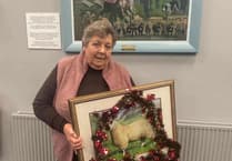 Ram sale stalwart receives framed painting in retirement