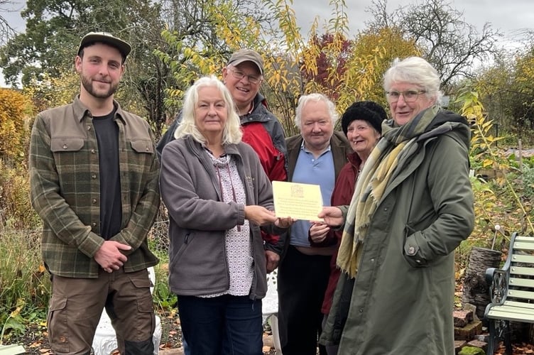 A presentation of the plaque to the Community Garden in Presteigne