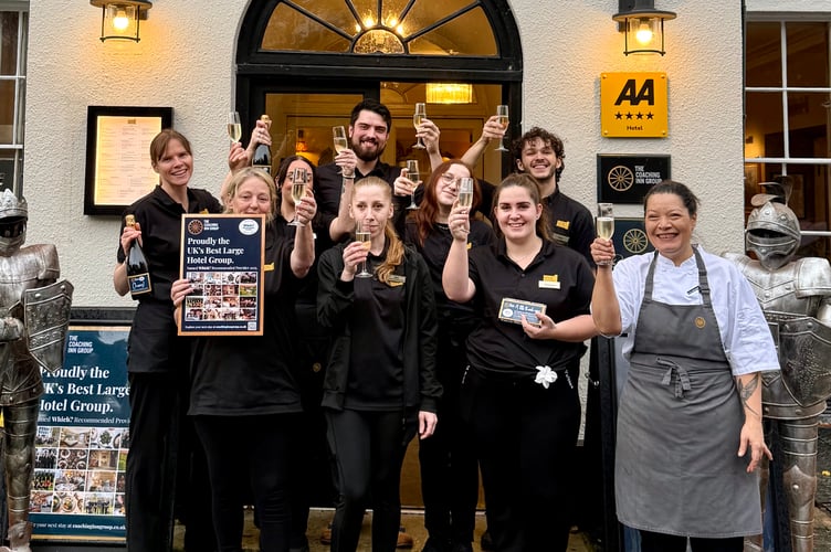 Staff at the Castle of Brecon Hotel celebrating the group’s national award.