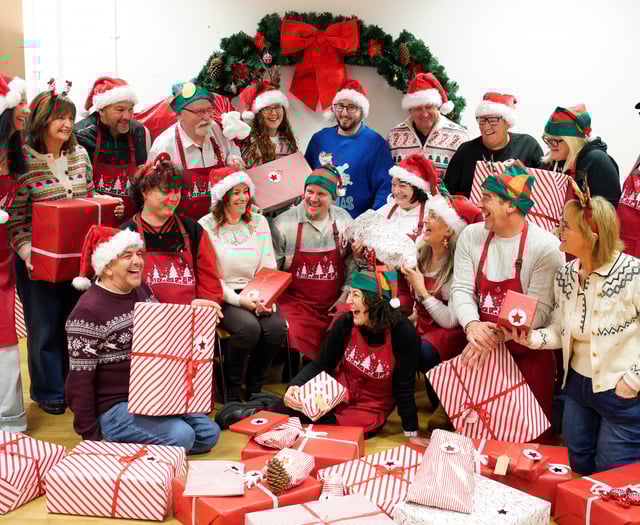 £1 million lottery winners from Brecon help pack toys for children