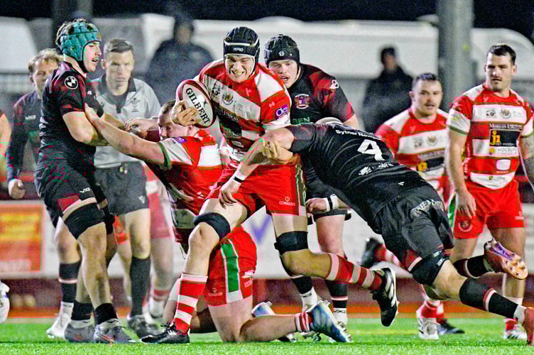 Harry Holden makes a try-scoring break for Llandovery