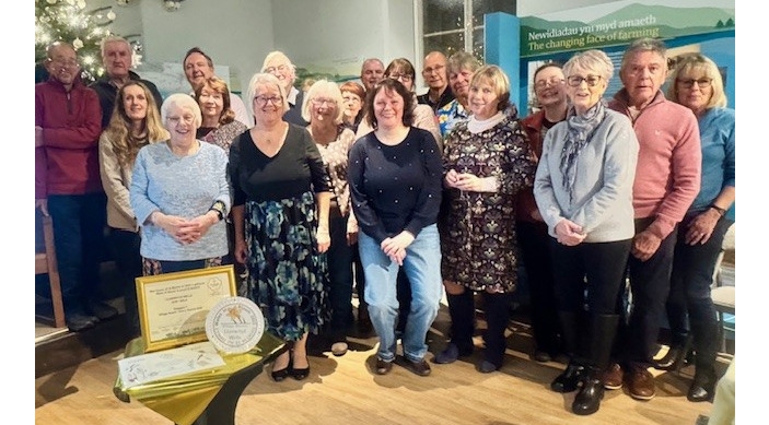 Volunteers and organisers celebrate Llanwrtyd Wells’ Gold Award in this year’s Wales in Bloom competition