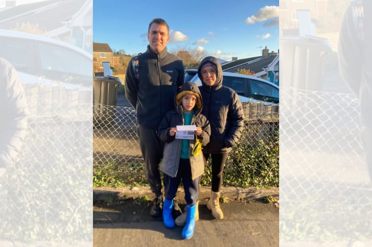 Year Six pupil Arthur Richards, pictured with parents Will and Stef, is supporting the campaign to save Crickhowell Sixth Form