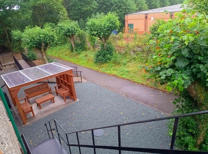 The outdoor area next to the building