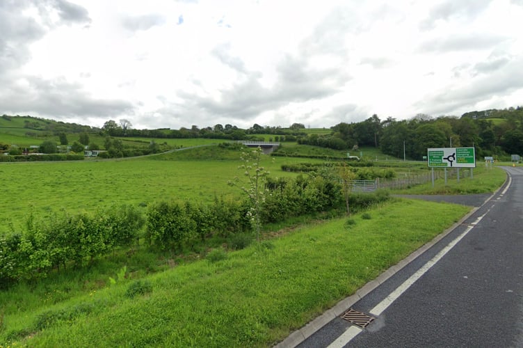 The site on the outskirts of Newtown where plans for a petrol filling station and restaurant have been approved
