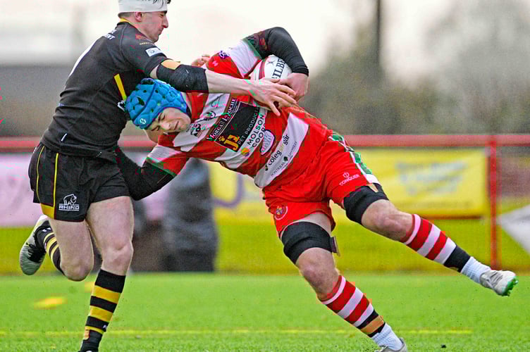 Llandovery's Tiaan Sparrow is tackled